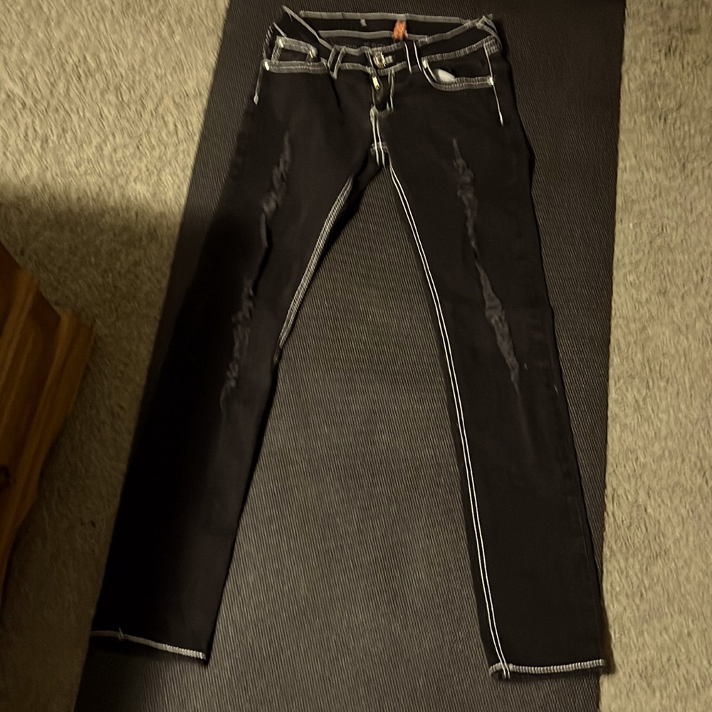 Black distressed jeans